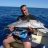 Happy angler, sambo and the demo Synit DeepShot Seriola Pro on Shikari Charters 12 Dec 2010